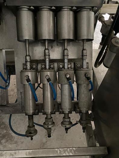 Used Raque 8 Head Piston Depositor