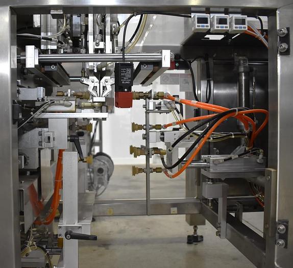 Used Apai bagger with 10 head scale