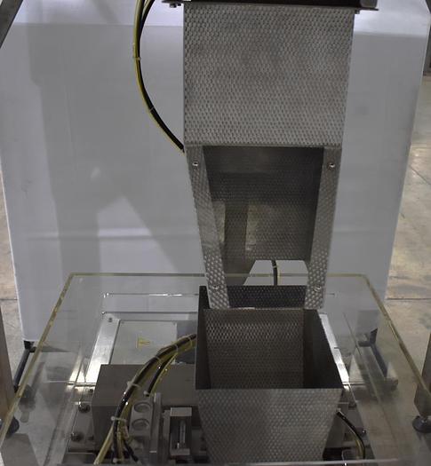 Used Apai bagger with 10 head scale