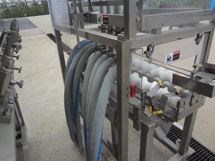 Used Raque 8 Head Piston Depositor