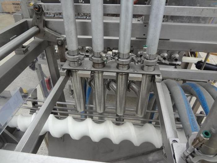 Used Raque 8 Head Piston Depositor