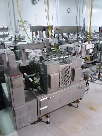 Used Rehon Dough Extruded Encruster