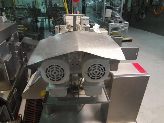 Used Rehon Dough Extruded Encruster