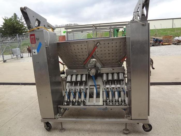 Used Raque 8 Head Piston Depositor
