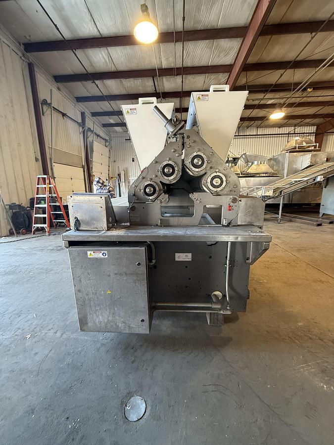 Used BAKER PERKINS 48 INCH WIDE 4 ROLL EXTRUDER