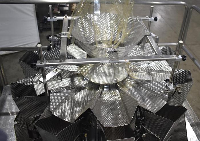 Used Apai bagger with 10 head scale