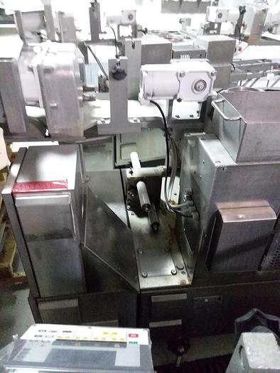 Used Rehon Dough Extruded Encruster