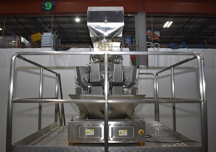 Used Apai bagger with 10 head scale