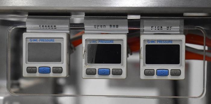 Used Apai bagger with 10 head scale