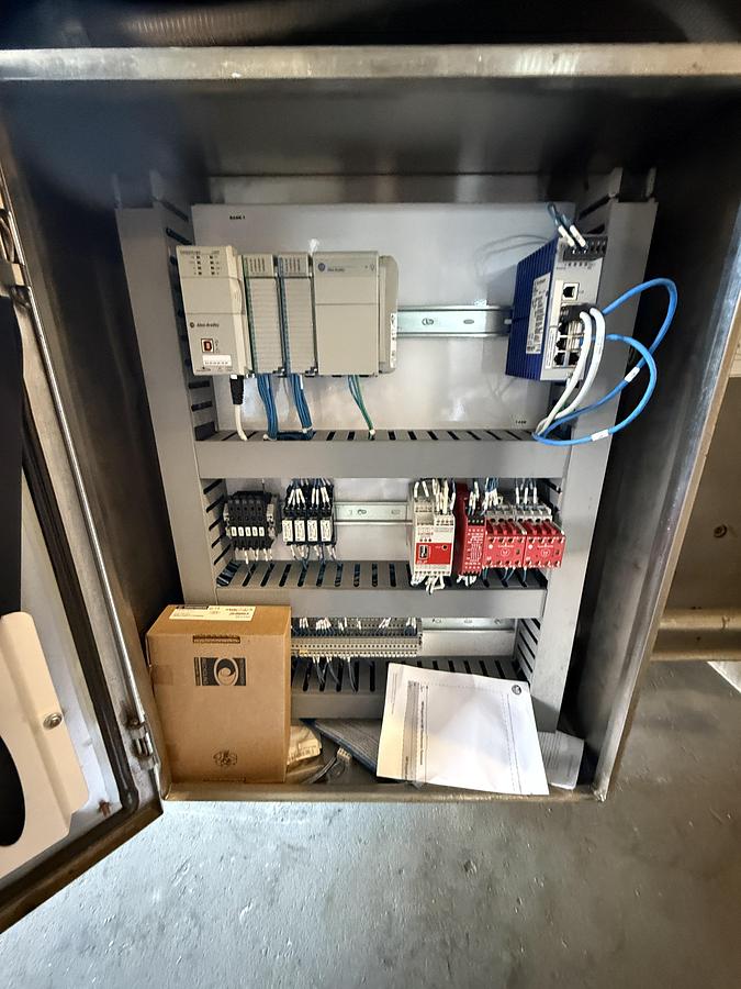 Used BAKER PERKINS 48 INCH WIDE 4 ROLL EXTRUDER