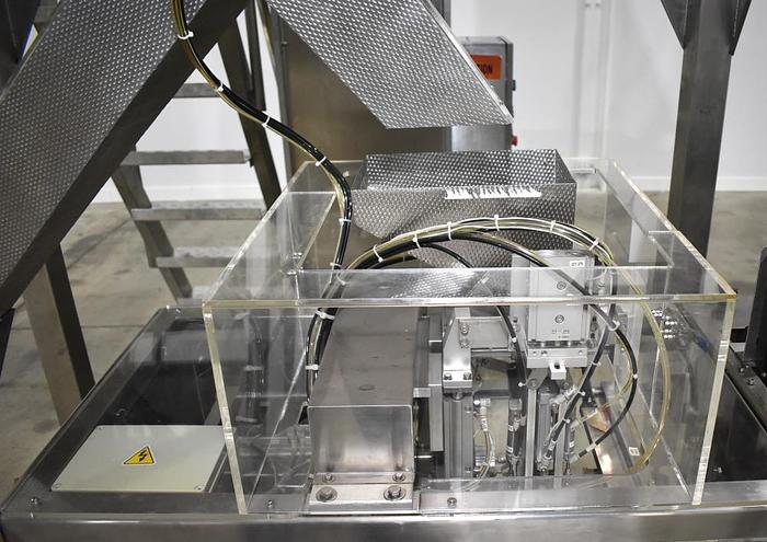 Used Apai bagger with 10 head scale