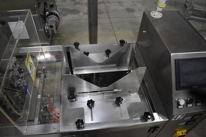 Used Apai bagger with 10 head scale