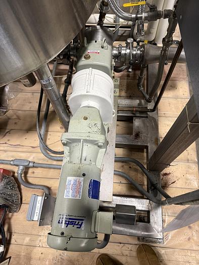 Used DUAL AB PROCESS TANKS WITH HEATERS AND PUMP