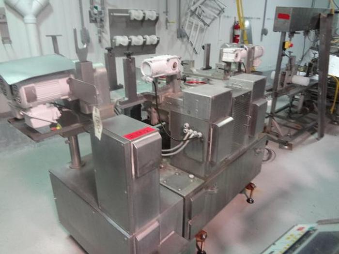 Used Rehon Dough Extruded Encruster