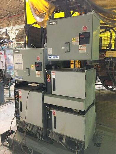 Used ABB IRBP C-1000 SPOT WELDING CELL WITH TWO ABB IRB 6640 180/2.55 ROBOTS & IRC 5 CONTROLLERS & ARO SERVO SPOT WELD GUNS