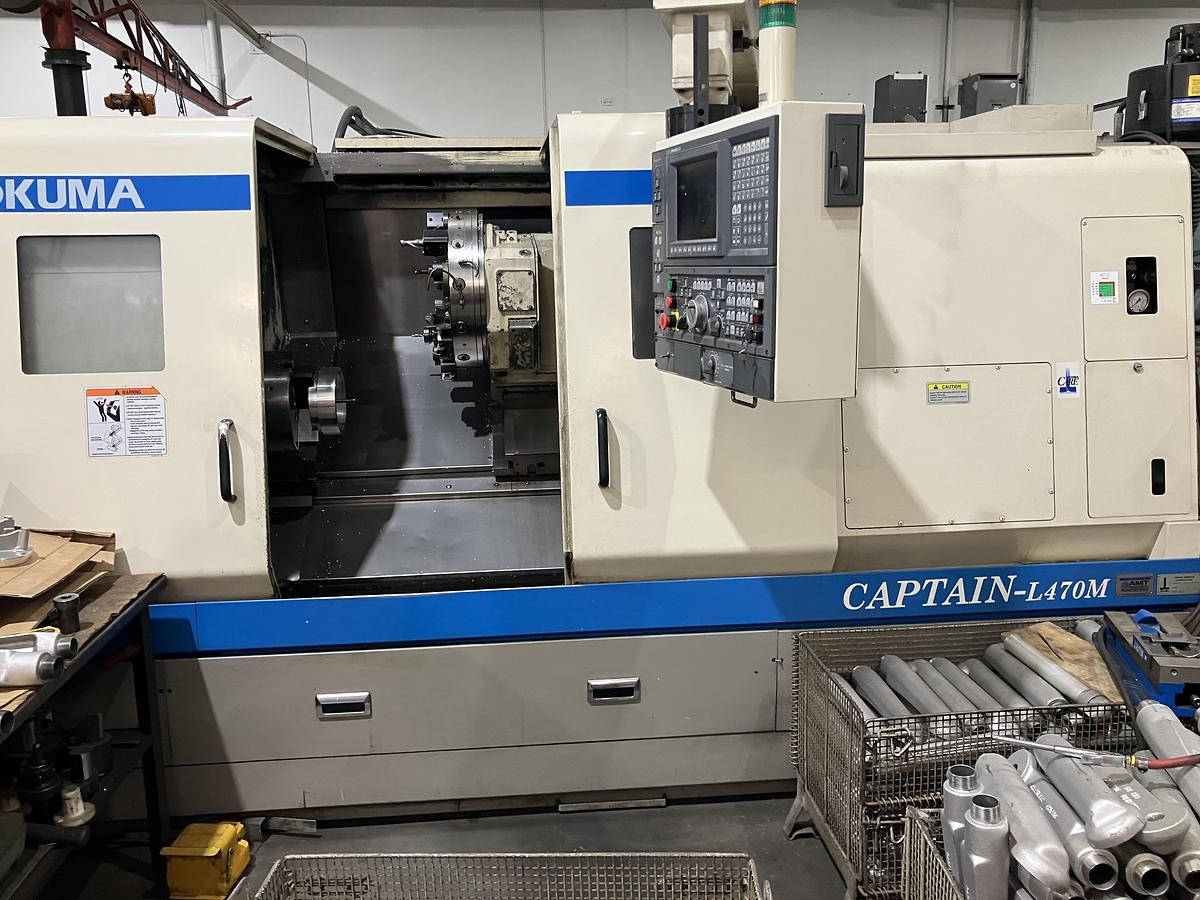 Used OKUMA CAPTAIN 470M CNC TURNING CENTER W/MILLING & TAILSTOCK, NEW 2003