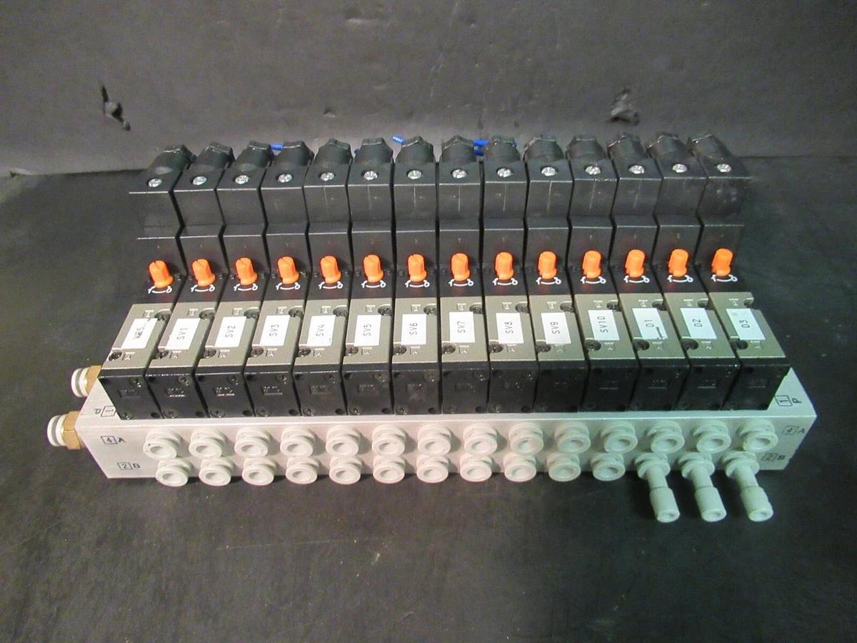 Used SMC SOLENOID VALVE BANK AND MANIFOLD 30-VZ-3140-5DC 24 VDC 0.075 AMP