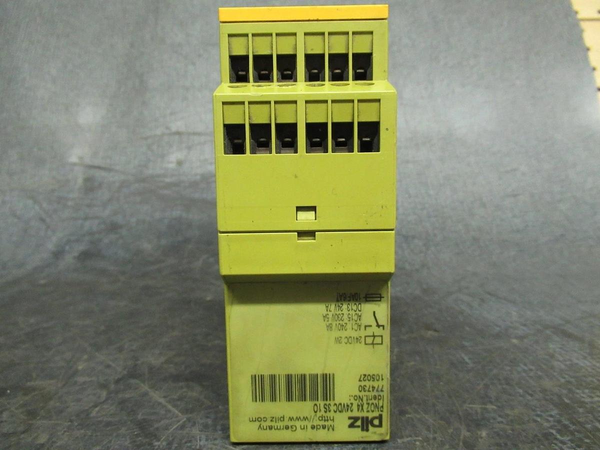 Used PILZ 2-CHANNEL SAFETY RELAY PNOZ-X4 C01C01N2-K011 240 VAC 8 AMP COIL: 24 VDC