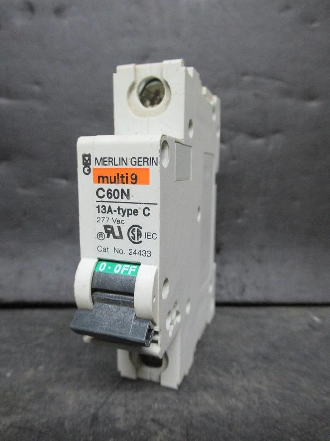 Used MERLIN GERIN SINGLE POLE BREAKER 24433 MULTI 9 C60N 13A-TYPE C 277 VAC