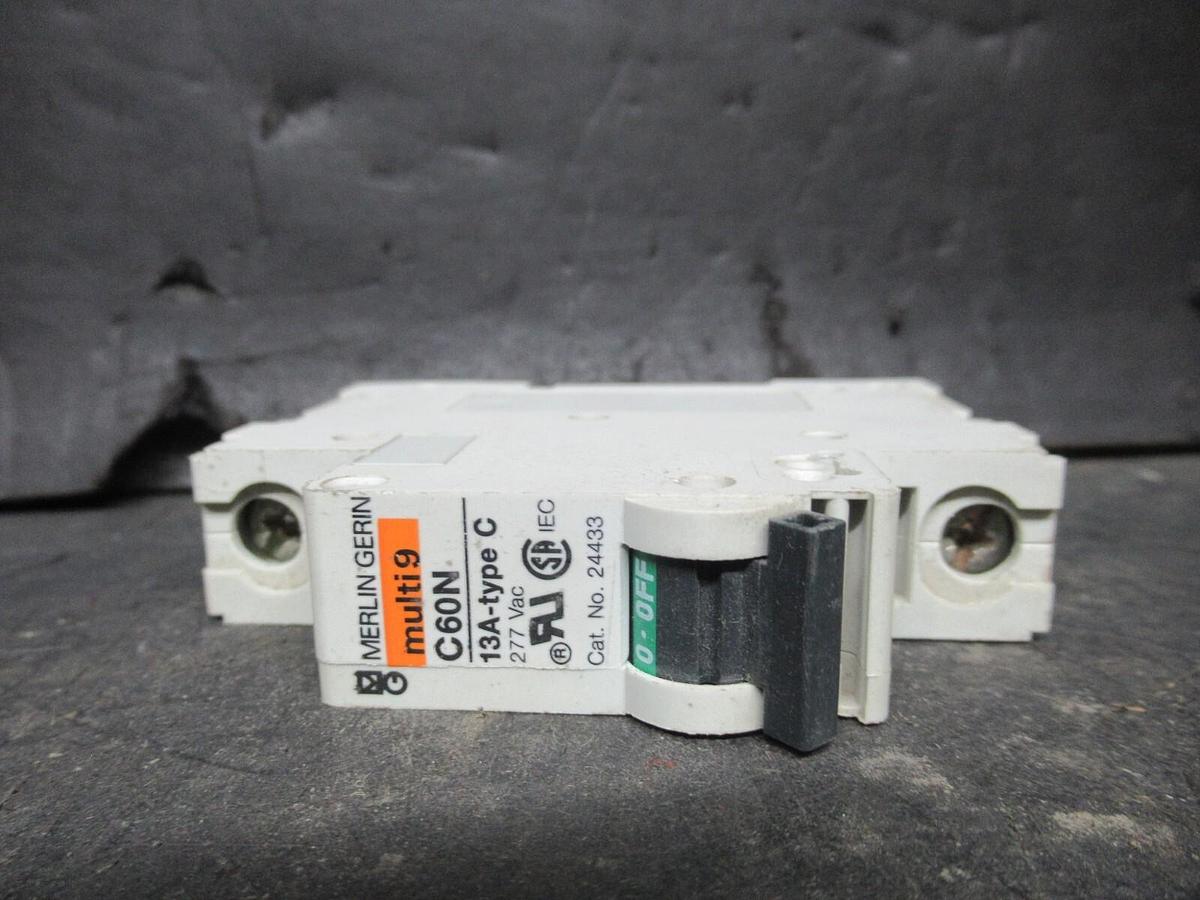 Used MERLIN GERIN SINGLE POLE BREAKER 24433 MULTI 9 C60N 13A-TYPE C 277 VAC