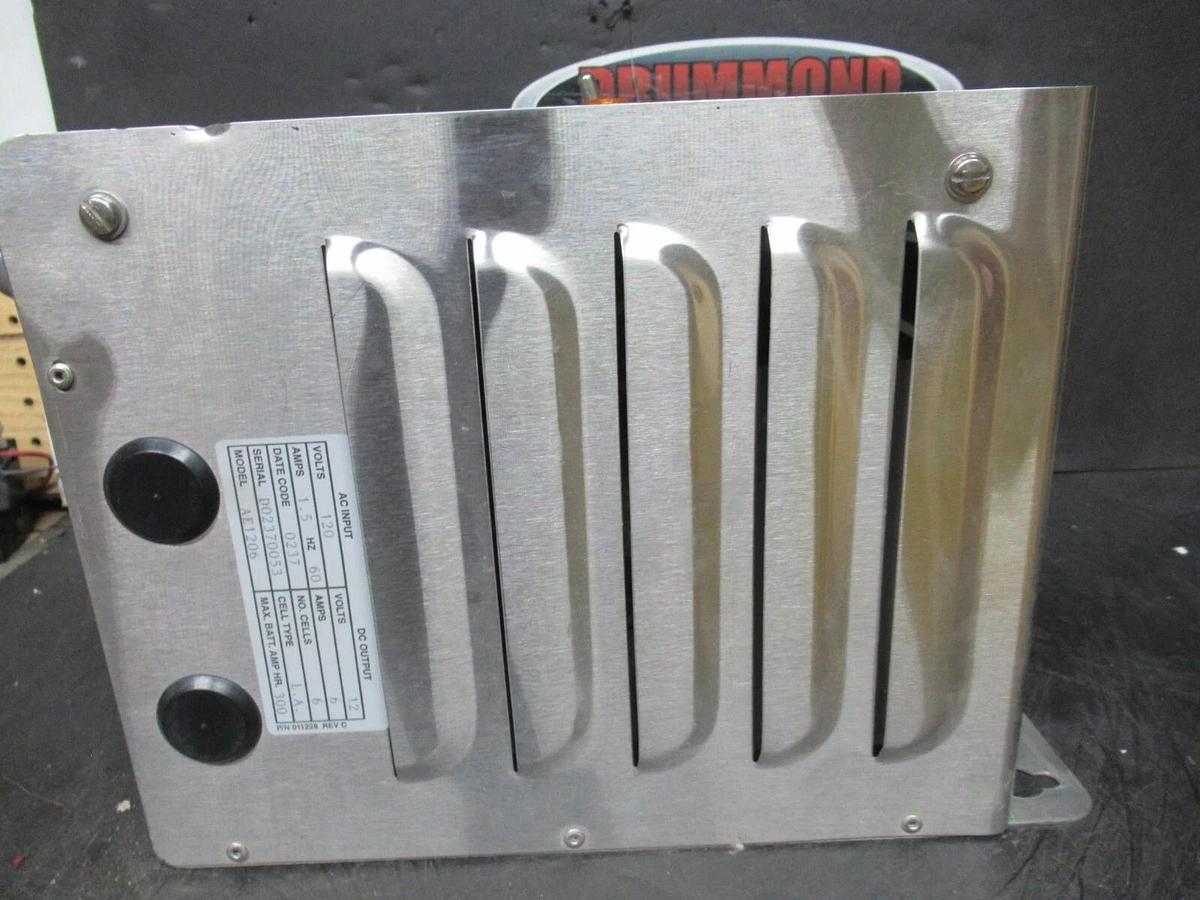 Used 12 VDC 6 AMP CHARLES BATTERY C-CHARGER INPUT: 1.5 AMPS 120 VAC AE1206 300 HOUR