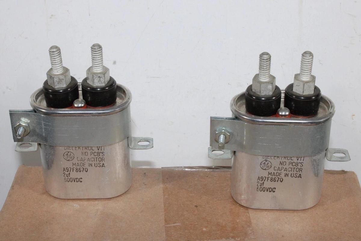 Used LOT OF 2 GENERAL ELECTRIC DIELEKTROL VII CAPACITOR A97F8670 2uF 600 VDC GE