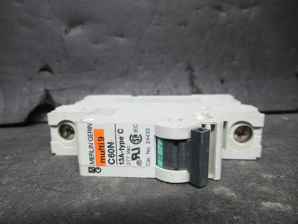 Used MERLIN GERIN SINGLE POLE BREAKER 24433 MULTI 9 C60N 13A-TYPE C 277 VAC