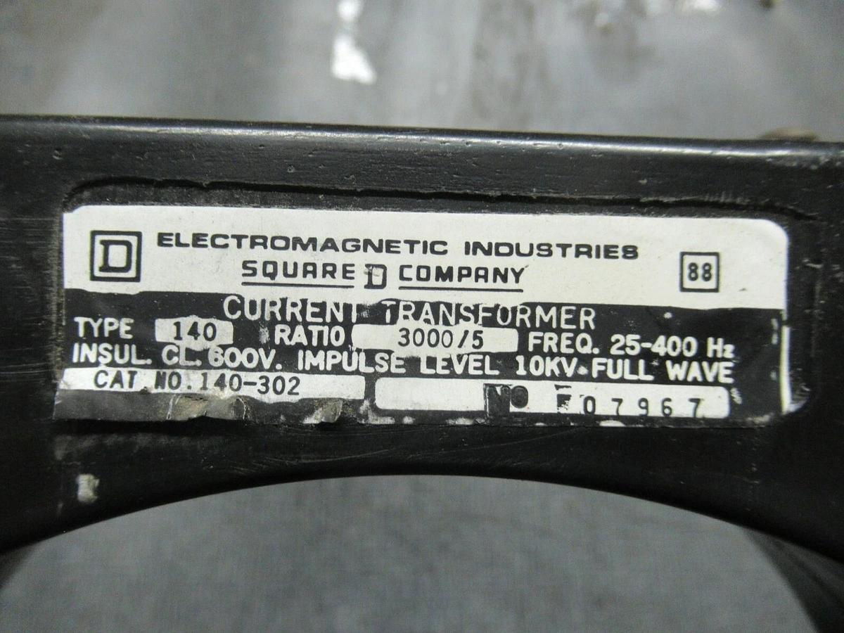 Used SQUARE D CT CAT: 140-302 3000:5 25-400 HZ 600 VOLTS **WARRANTY INCLUDED**