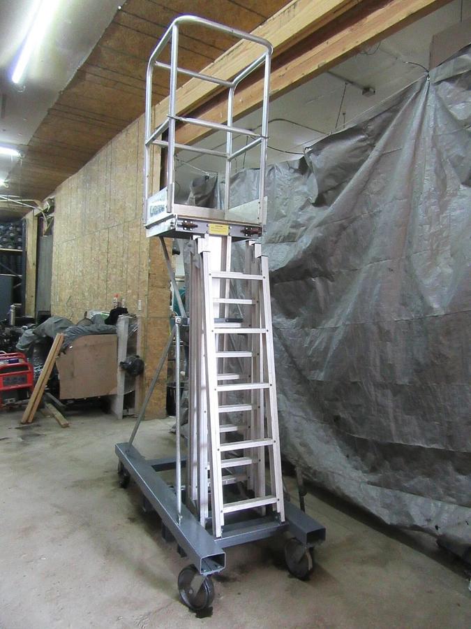 Used 300 LB CAPACITY GENIE EASY-UP 15 FT HT MANUAL PUSH ARIAL WORK PLATFORM EU-15M
