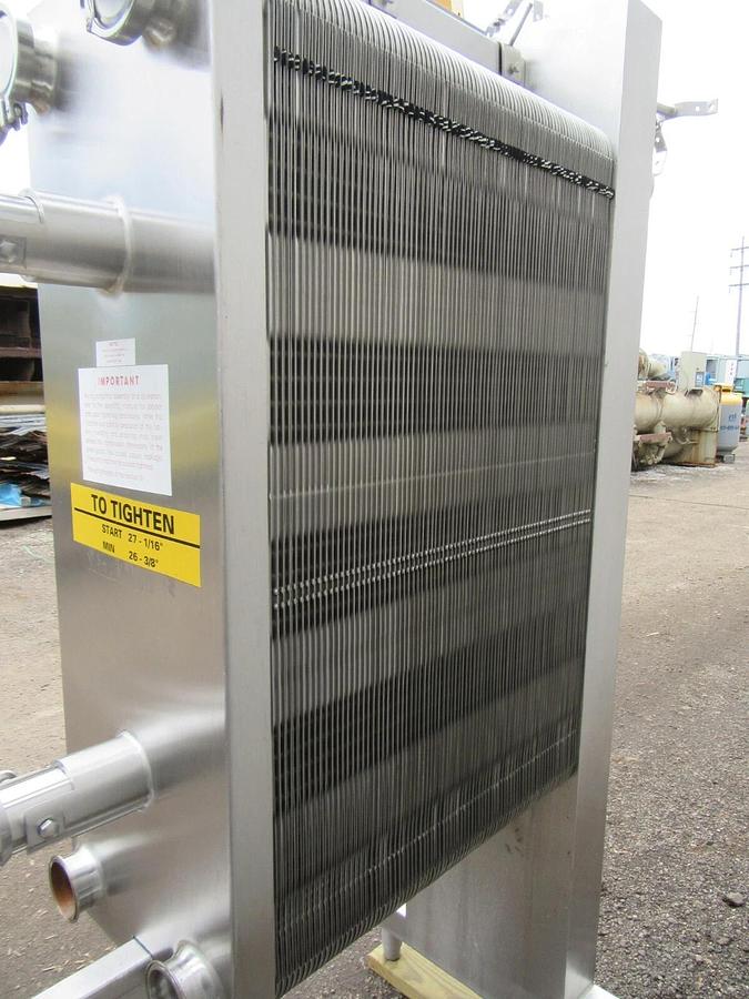 Used 600 SQ FT STAINLESS STEEL 3" IN / OUT APV PLATE AND FRAME HEAT EXCHANGER 23948