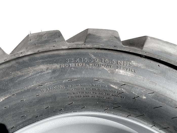 Used OUTRIGGER 33x15.50 -16.5 NHS