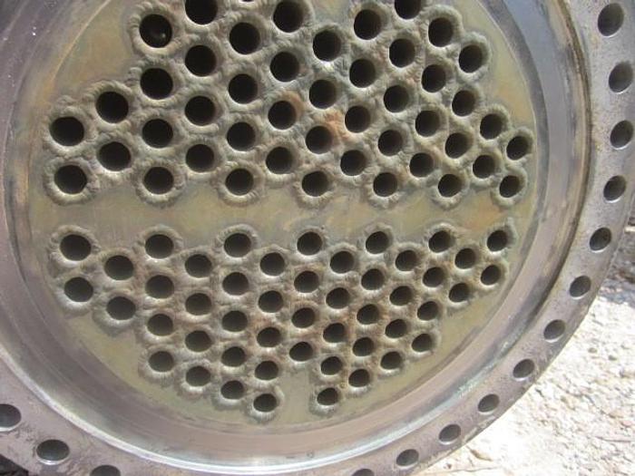 Used Used Southern Heat Exchanger approximately 300 sq ft 304L vertical shell and tube heat exchanger.