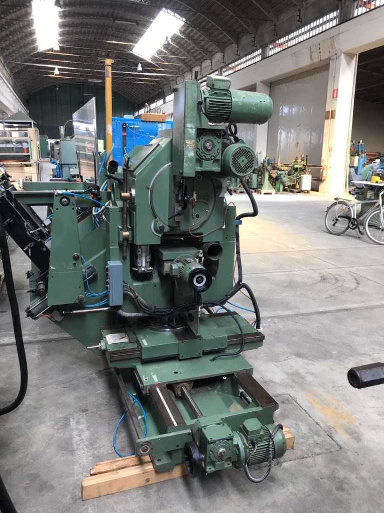 Usato 1990 Tenonatrice stondante doppia, automatica, marca Bacci
