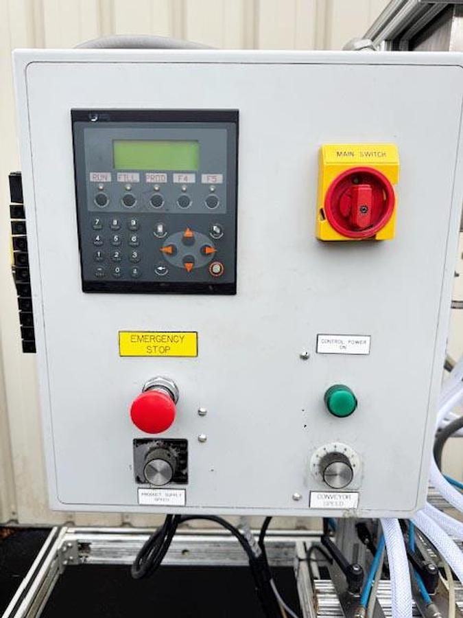 Used Equipment Express (E-PAK) 8-Valve Inline Bottle Filler