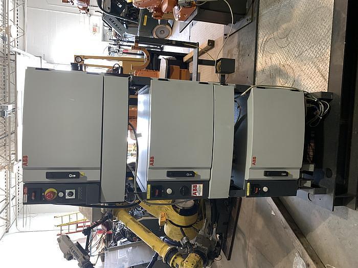 Used ABB IRB 1600-5/1.45 DUAL ARM ROBOTIC CELL WITH ABB TYPE MTC 750 POSITIONER AND IRC5 CONTROLLERS