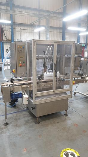 Used King 6 head liquid filler