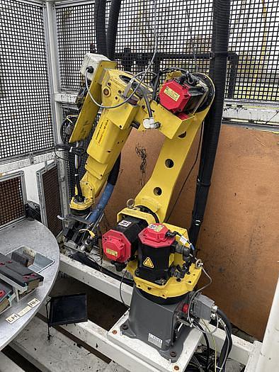 Used 2008 FANUC M10iA DUAL ARM ROBOTIC FOAM CELL WITH A/B SIDED INDEX TABE/ COULD CONVERT TO WELD CELL