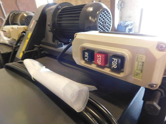 Used (1) Jordan Industrial Elevated Chip Conveyor for Okuma Genos L3000-E For CNC Turning Centers