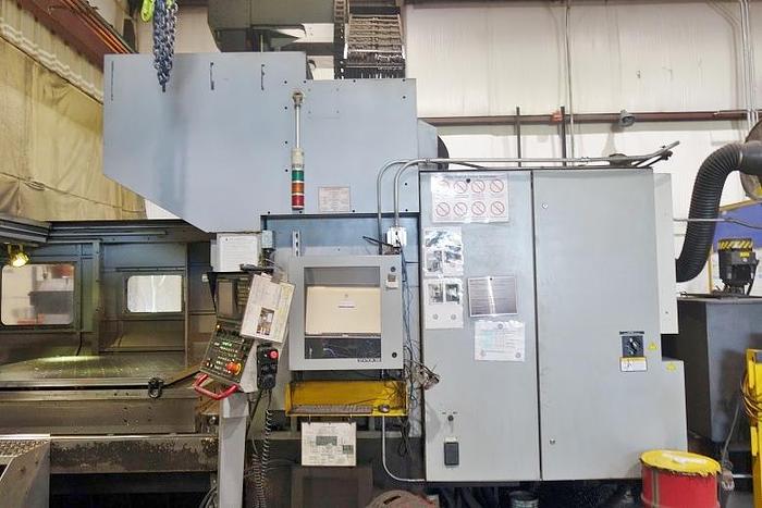 Used Toyoda Wele CNC Vertical Bridge Mill Fanuc