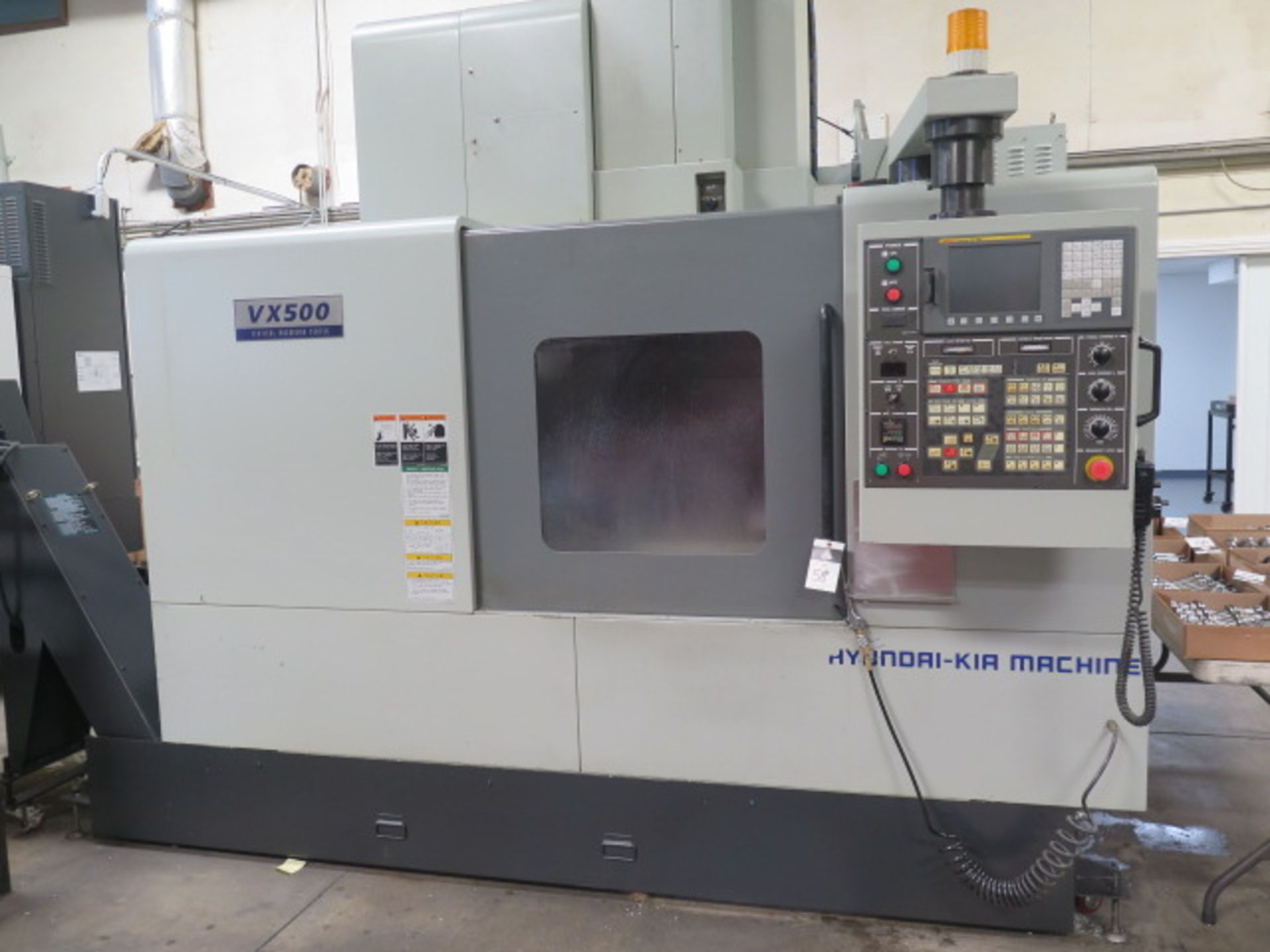 Used 2004 Hyundai WIA VX500 4-Axis CNC Vertical Machining Center w/ Hyundai WIA Fanuc i-Series Controls #5843