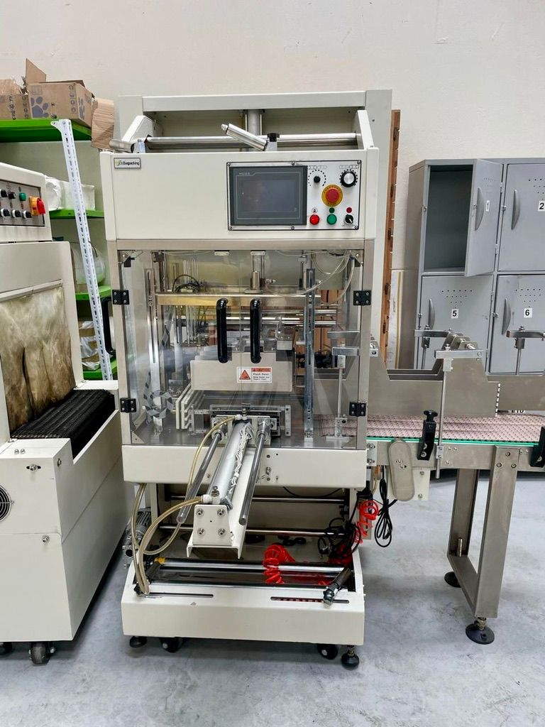 Usado MÁQUINA ENVOLVEDORA CON TÚNEL TERMOENCOGIBLE SEMIAUTOMÁTICA