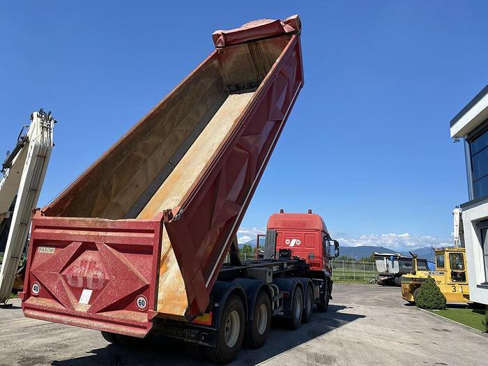 Usato 2010 IVECO TRAKKER 500 CON SEMIRIMORCHIO VASCA