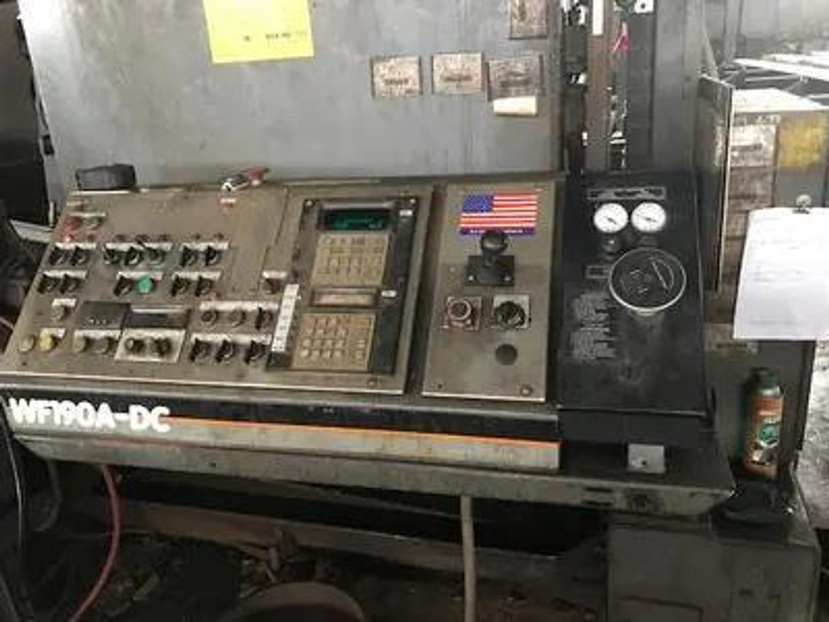 Used HEM saw Model WF 190A-DC Capacity 25" x 44" Automatic, Dual Column, , 24" Roller Discharge, Optional Top Clamp, Bi-Directional Outboard Powered Vise on Feed Table