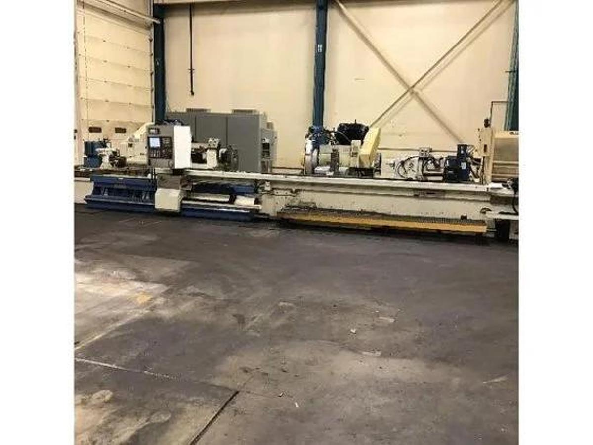 Used 2013 NAXOS CNC Multi-Axis Cycle Cylindrical Grinder with Two Workheads, 24.78" x 191"