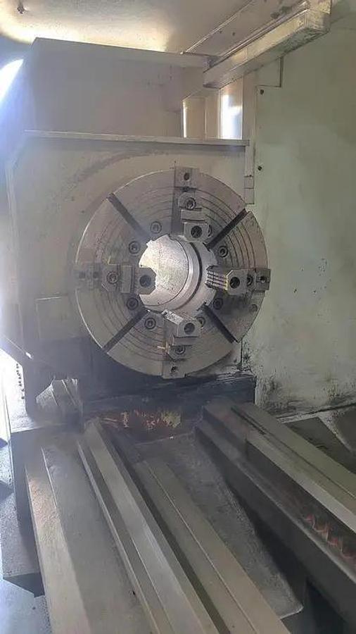 Used 2006 HANKOOK Protec 9NC X 4000 WITH 10" Bar Capacity, 160" Centers, (2)- 25" Manual Chucks, FANUC 21iTB Run Time Hours 6,069