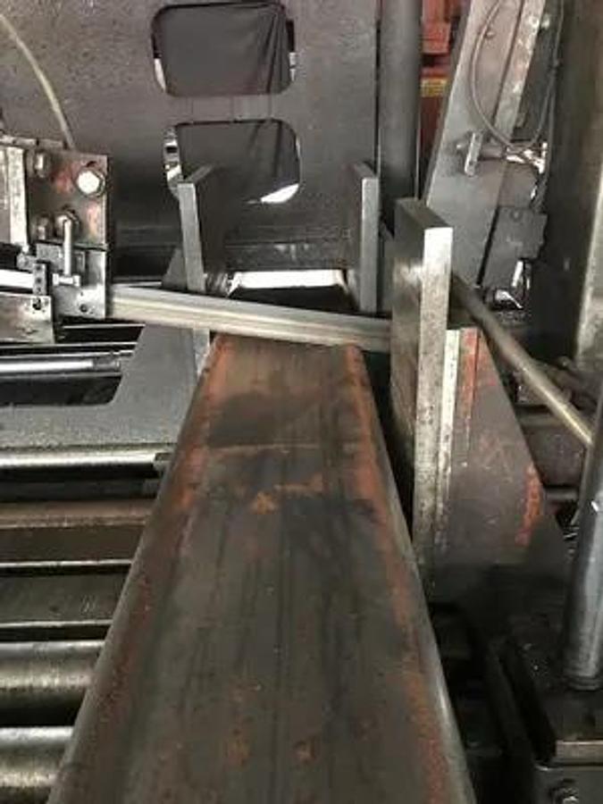 Used HEM saw Model WF 190A-DC Capacity 25" x 44" Automatic, Dual Column, , 24" Roller Discharge, Optional Top Clamp, Bi-Directional Outboard Powered Vise on Feed Table