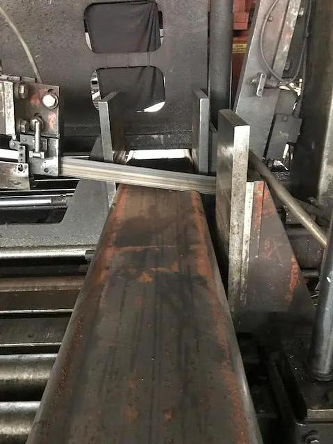 Used HEM saw Model WF 190A-DC Capacity 25" x 44" Automatic, Dual Column, , 24" Roller Discharge, Optional Top Clamp, Bi-Directional Outboard Powered Vise on Feed Table