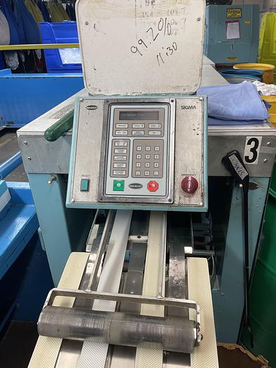 Used 2002 Braun rear discharge small piece folder