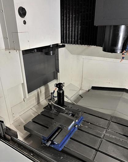 Used 2018 OKUMA GENOS M560-V CNC MACHINING CENTER WITH NIKKEN 10” ROTARY TABLE & CHUCK