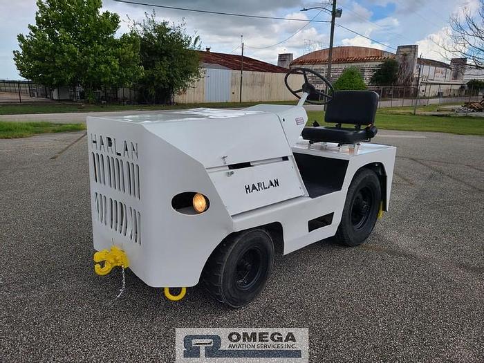 Used 2001 Harlan HTAG-50, baggage tow tractor.